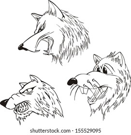 Aggressive wolf heads. Set of black and white vector tattoo designs.