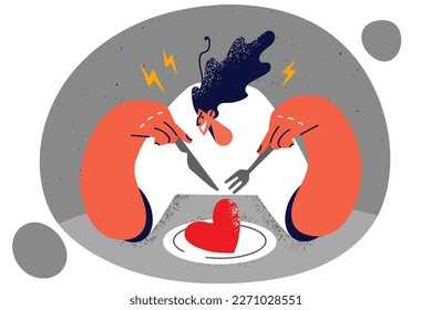 Aggressive woman sits with fork and knife in hands near plate with heart as symbol of dominance and hatred in relationship. Girl angry at boyfriend after divorce wants to take revenge on boyfriend