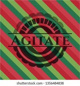 Agitate christmas emblem.