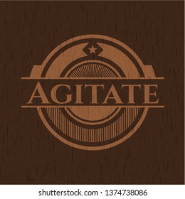 Agitate retro style wooden emblem
