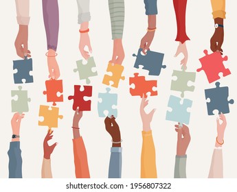 Agreement or affair between a group of colleagues or collaborators. Diversity people co-workers who collaborate. Arms and hands holding a jigsaw puzzle piece.Concept of sharing.Community