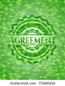 Agreement green emblem with triangle mosaic background