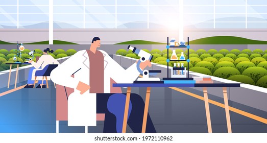 agricultural engineers researching plants scientists making chemical experiments in lab agriculture smart farming