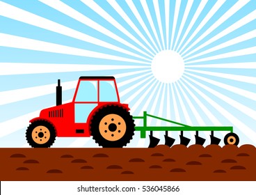 Agricultural work, red tractor on field  