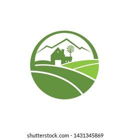 Agriculture farming logo with farm house and mountain on the background