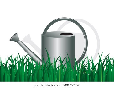 agriculture. Grass with drops of water and a watering can.
