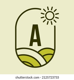 Agriculture Logo On Letter A Emblem Template. Farmland Letter A Agro Farm, Agribusiness, Eco-farm Sign with Sun and Agricultural Field Symbol