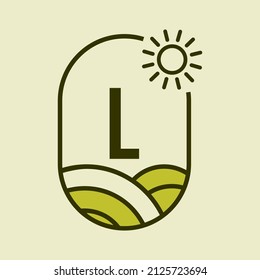 Agriculture Logo On Letter L Emblem Template. Farmland Letter L Agro Farm, Agribusiness, Eco-farm Sign with Sun and Agricultural Field Symbol