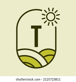Agriculture Logo On Letter T Emblem Template. Farmland Letter T Agro Farm, Agribusiness, Eco-farm Sign with Sun and Agricultural Field Symbol