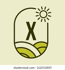 Agriculture Logo On Letter X Emblem Template. Farmland Letter X Agro Farm, Agribusiness, Eco-farm Sign with Sun and Agricultural Field Symbol