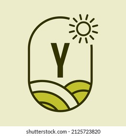 Agriculture Logo On Letter Y Emblem Template. Farmland Letter Y Agro Farm, Agribusiness, Eco-farm Sign with Sun and Agricultural Field Symbol