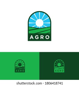 Diseño del logo agronómico. Sol sobre un campo verde.