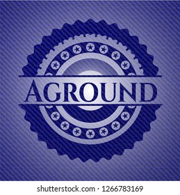 Aground emblem with jean background