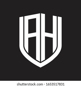 Monograma del logotipo AH con diseño de escudo de emblemas aislado en fondo negro