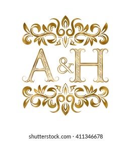 A&H vintage initials logo symbol. Letters A, H, ampersand surrounded floral ornament. Wedding or business partners initials monogram in royal style.