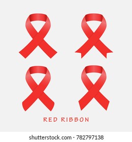 Aids awareness red ribbon set on gray background. World Aids day concept. 