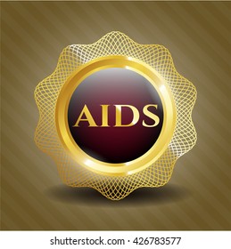 Emblema dorado del SIDA
