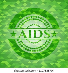 AIDS green emblem. Mosaic background