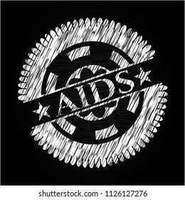 AIDS written on a chalkboard