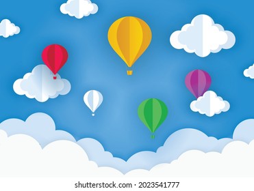 Air ballon and cloud in the blue sky. Paper art style.