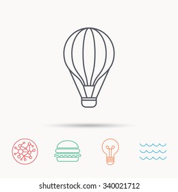 Air balloon icon. Fly transport sign. Airship travel symbol. Global connect network, ocean wave and burger icons. Lightbulb lamp symbol.