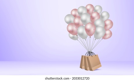 Air balloons holding shopping bags on pastel color background.