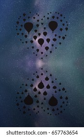 Air balloons in shape of heart at night. Abstract vector illustration with silhouette of flying aerostats reflecting in water