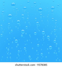 air bubbles floating in blue clear water