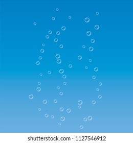 Air bubbles flow on blue sea background. Oxygen in water, sea, aquarium. Fizzy drink