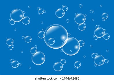 Air bubbles underwater on blue background.  Soap  bubbles