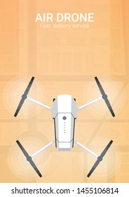 Air delivery. Drone flying over the city. City map on the background. Aerial Drone taking photography and video