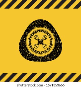 air drone icon black grunge emblem with yellow background. Vector Illustration. Detailed.