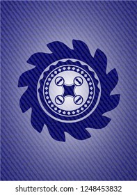 air drone icon inside badge with jean texture