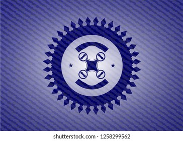 air drone icon inside badge with denim texture