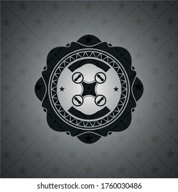 air drone icon inside black emblem. 