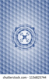 air drone icon inside blue polygonal emblem.