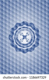 air drone icon inside blue emblem or badge with abstract geometric polygonal pattern background.