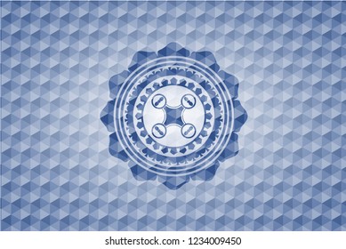 air drone icon inside blue emblem or badge with abstract geometric pattern background.