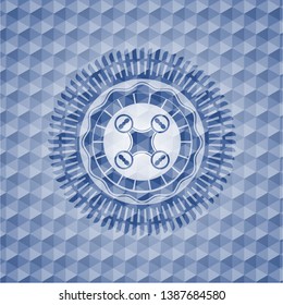 air drone icon inside blue emblem with geometric background.