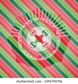 air drone icon inside christmas colors emblem.