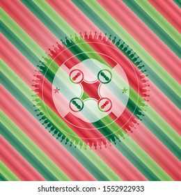 air drone icon inside christmas colors style emblem.