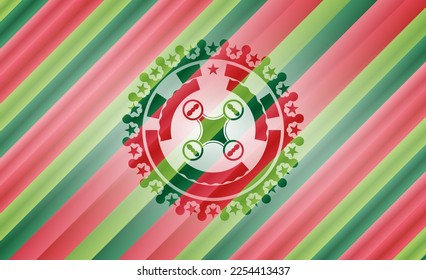 air drone icon inside christmas colors style badge. 
