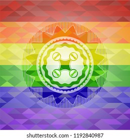 air drone icon inside emblem on mosaic background with the colors of the LGBT flag