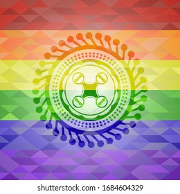 air drone icon inside emblem on mosaic background with the colors of the LGBT flag