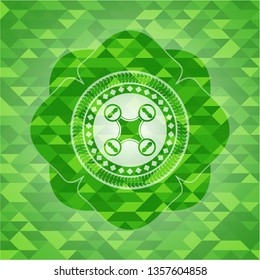 air drone icon inside green mosaic emblem