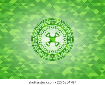 air drone icon inside green mosaic emblem. 