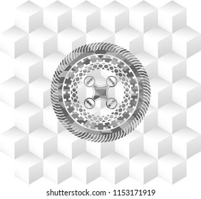 air drone icon inside grey icon or emblem with geometric cube white background