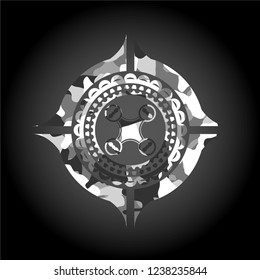 air drone icon inside grey camo emblem