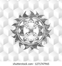 air drone icon inside grey icon or emblem with geometric cube white background