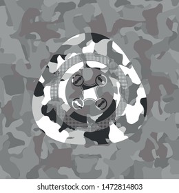 air drone icon inside grey camo emblem